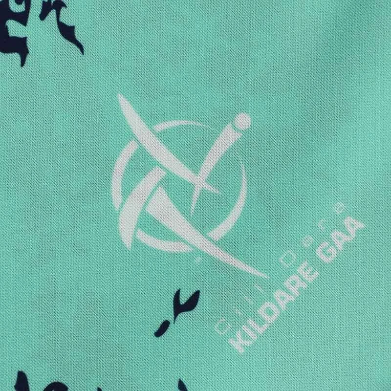 Kildare GAA Kids' Short Sleeve Training Top Mint / Marine - Image 3